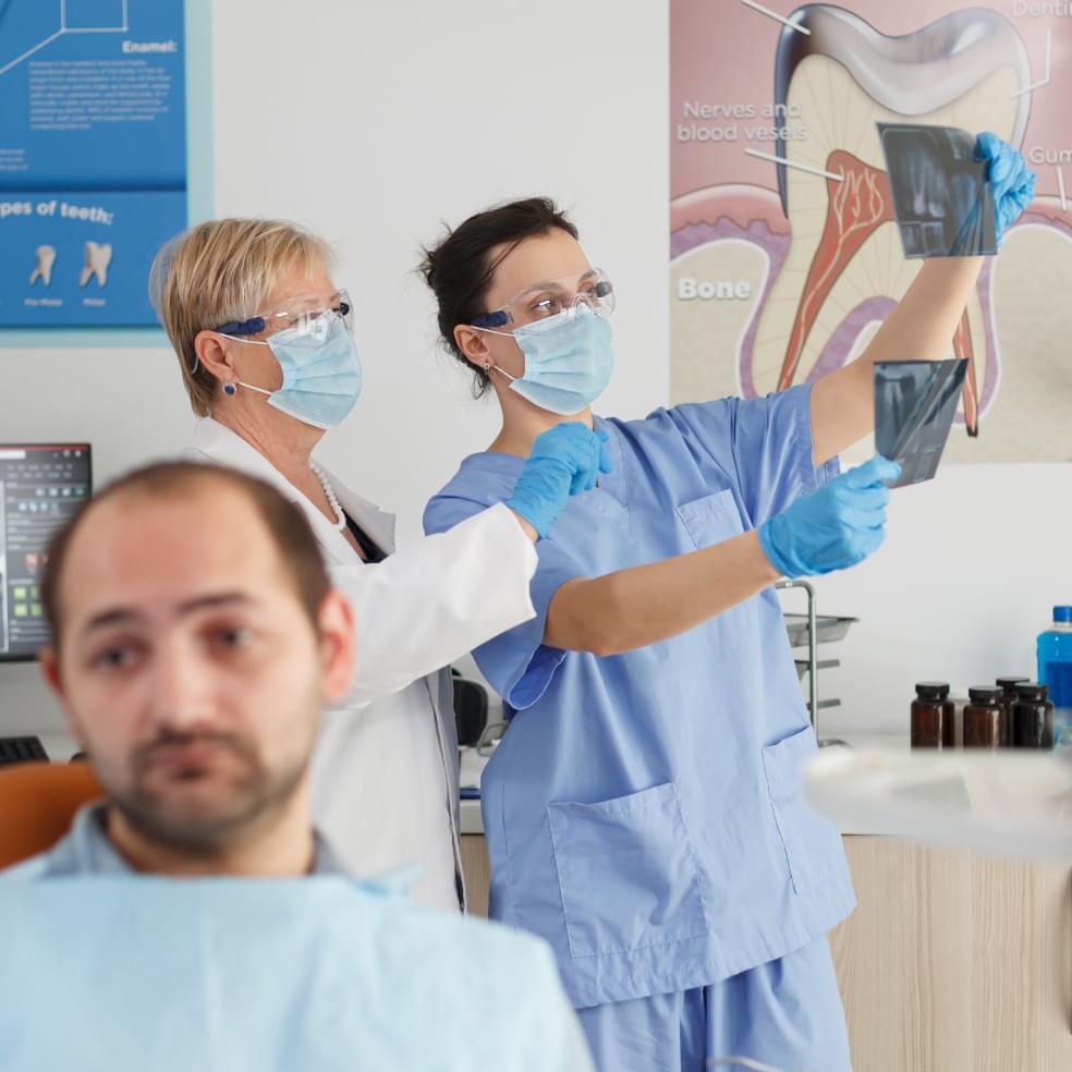 My Dental Hub dentist performing a root canal procedure on a patient in Skokie, IL