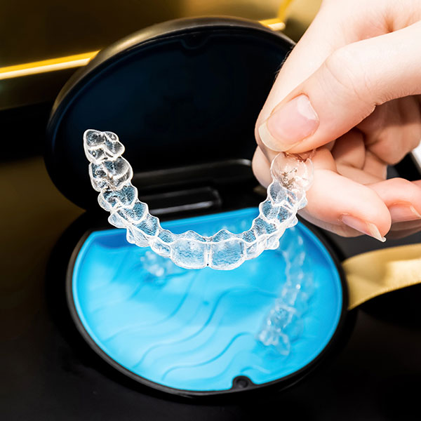 My Dental Hub Invisalign clear aligners displayed in their storage case in Skokie, IL