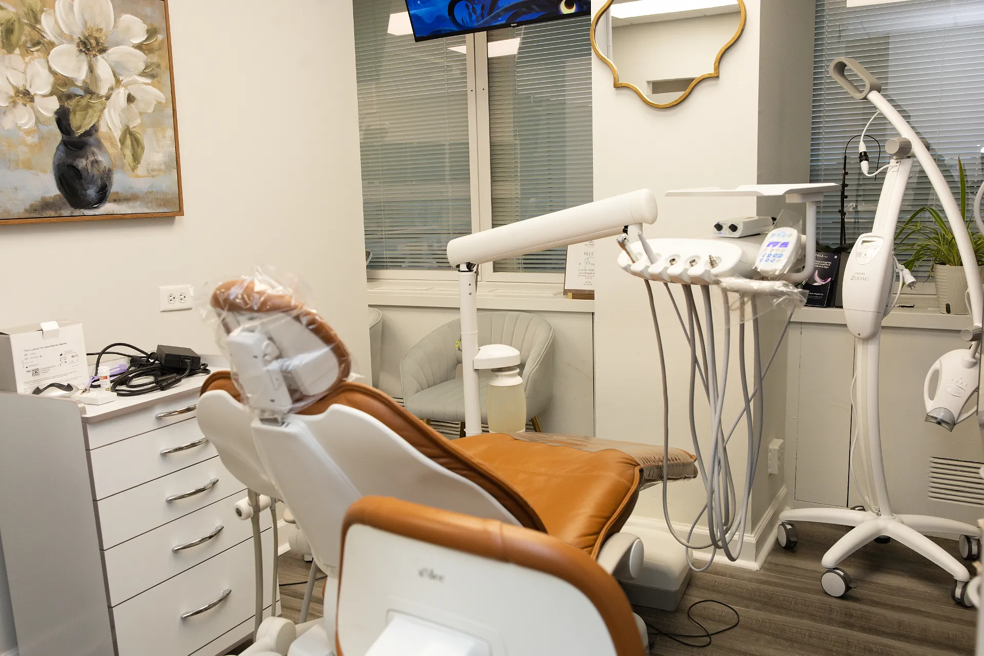 Dental treatment room with tan leather dental chair, delivery unit, and equipment — My Dental Hub in Skokie, IL
